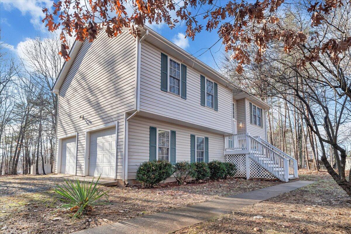 1093 Hales Ford Road Moneta, VA 24121 - Photo 43 of 45 a front view of a house with a yard