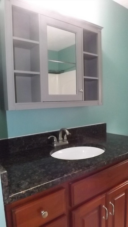 45 Cudworth Road Webster, MA 01570 - Photo 19 of 28 a kitchen with a sink and a window