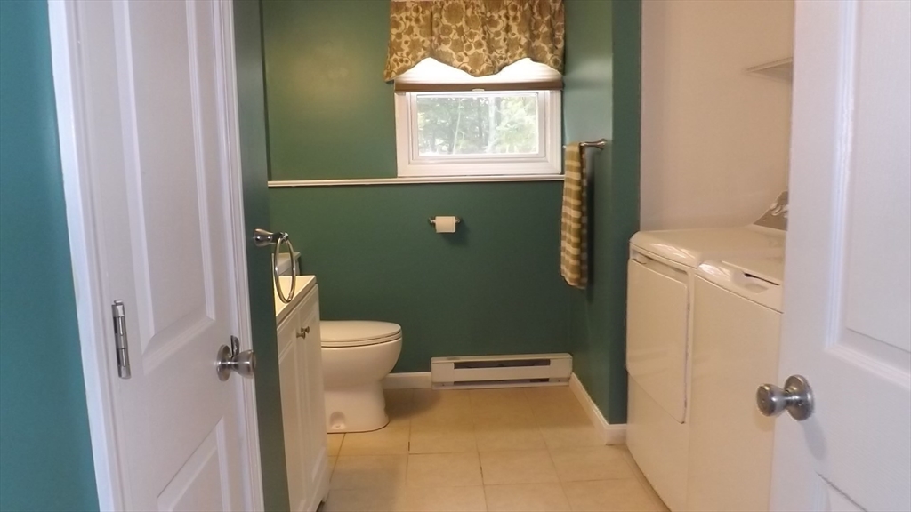 45 Cudworth Road Webster, MA 01570 - Photo 24 of 28 a bathroom with a toilet and a sink