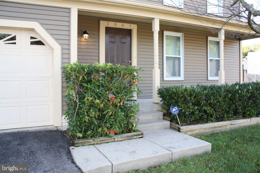 3041 Memory Lane Silver Spring, MD 20904 - Photo 2 of 35 Concrete sidewalk to covered entrance