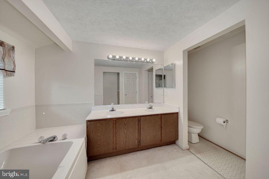 3041 Memory Lane Silver Spring, MD 20904 - Photo 23 of 35 Principal bathroom with dual sinks and soaking tub