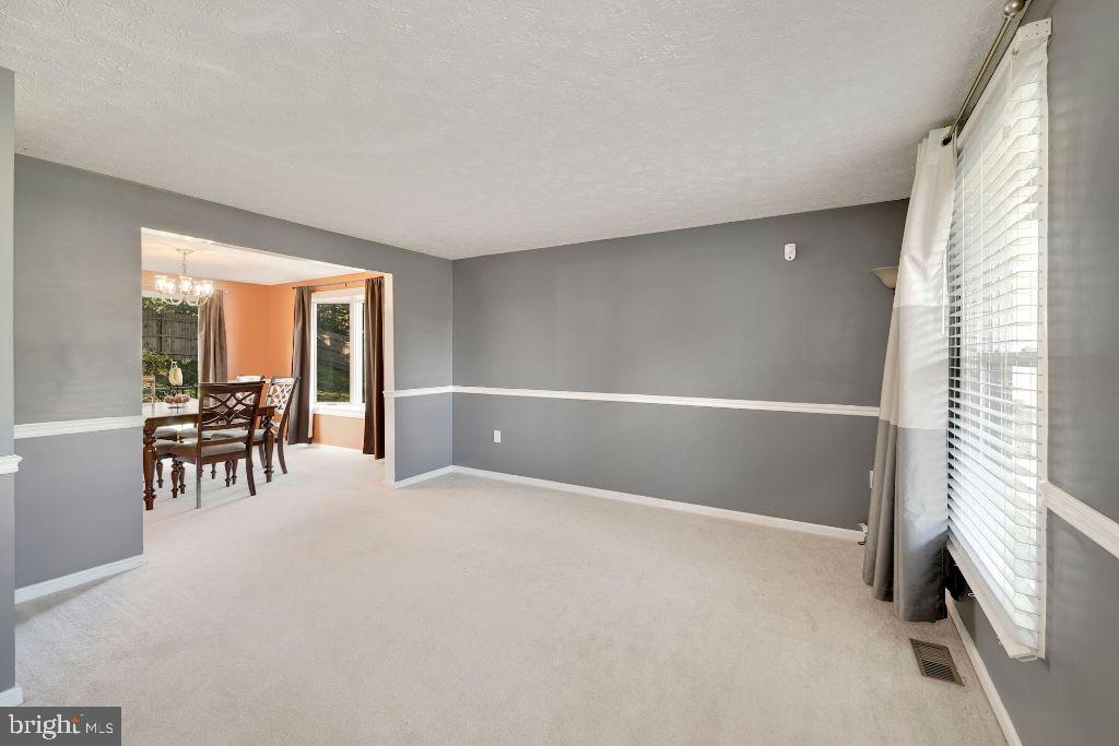 3041 Memory Lane Silver Spring, MD 20904 - Photo 5 of 35 Living room to Dining room