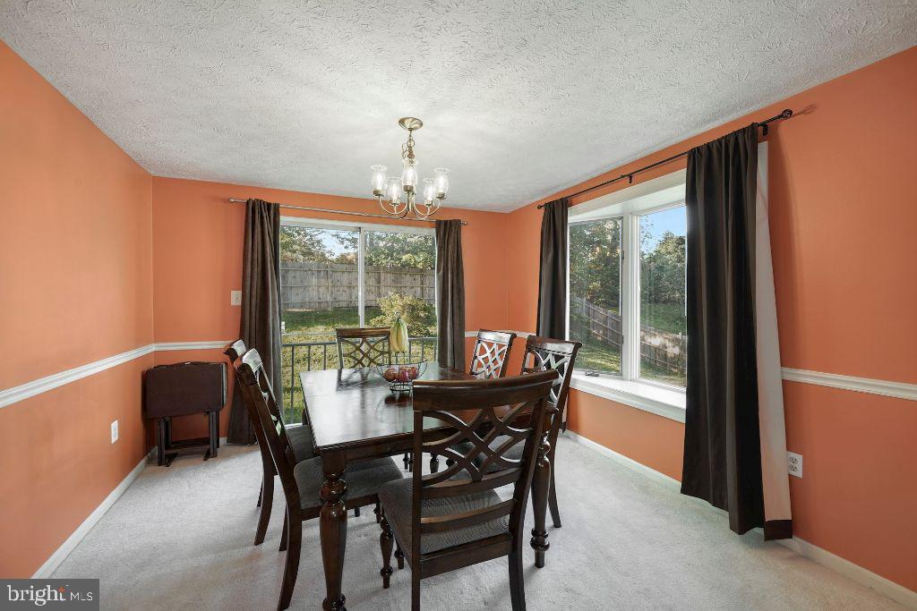 3041 Memory Lane Silver Spring, MD 20904 - Photo 7 of 35 Living room with bay window to right