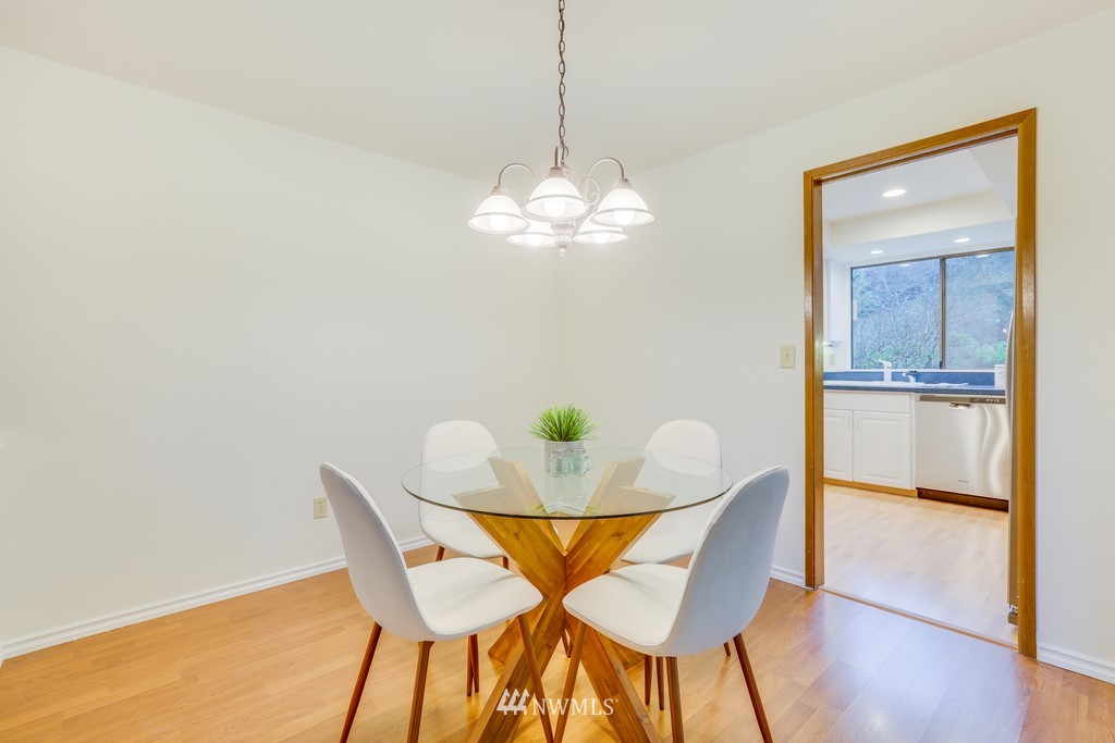 15909 Southeast 178th Street Renton, WA 98058 - Photo 11 of 30 a dining room with a table and chairs