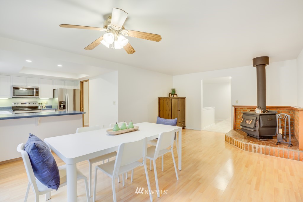 15909 Southeast 178th Street Renton, WA 98058 - Photo 18 of 30 a kitchen with a table and chairs in it
