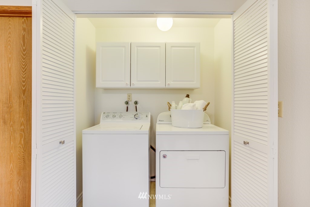 15909 Southeast 178th Street Renton, WA 98058 - Photo 20 of 30 a utility room with dryer and washer