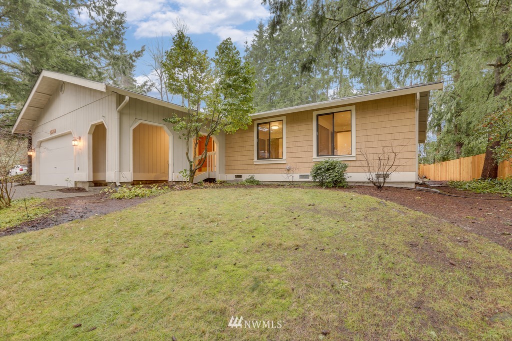 15909 Southeast 178th Street Renton, WA 98058 - Photo 3 of 30 a white house that has a tree in front of it