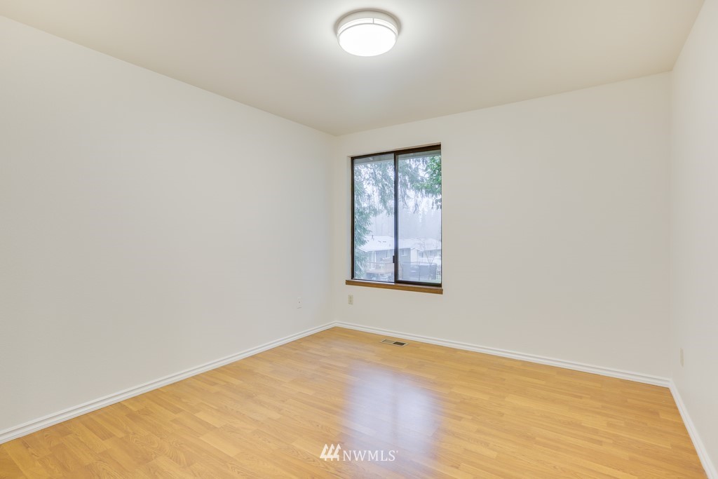 15909 Southeast 178th Street Renton, WA 98058 - Photo 24 of 30 an empty room with a window