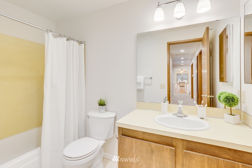 15909 Southeast 178th Street Renton, WA 98058 - Photo 26 of 30 a bathroom with a sink a toilet and shower
