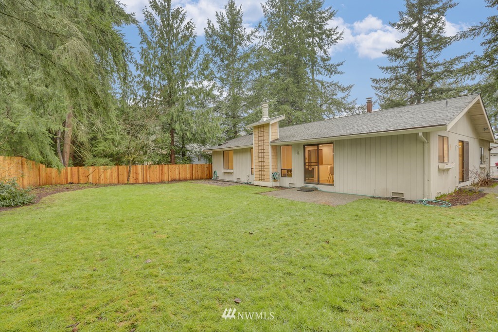15909 Southeast 178th Street Renton, WA 98058 - Photo 28 of 30 a front view of house with yard and green space