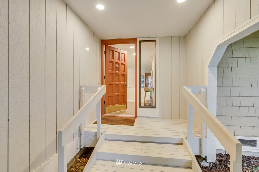 15909 Southeast 178th Street Renton, WA 98058 - Photo 4 of 30 a view of staircase with white walls and a window