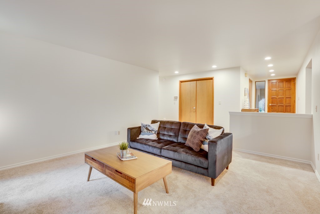 15909 Southeast 178th Street Renton, WA 98058 - Photo 6 of 30 a living room with furniture and a window