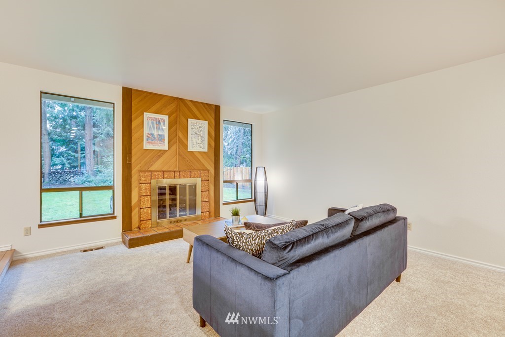 15909 Southeast 178th Street Renton, WA 98058 - Photo 8 of 30 a living room with furniture and a window