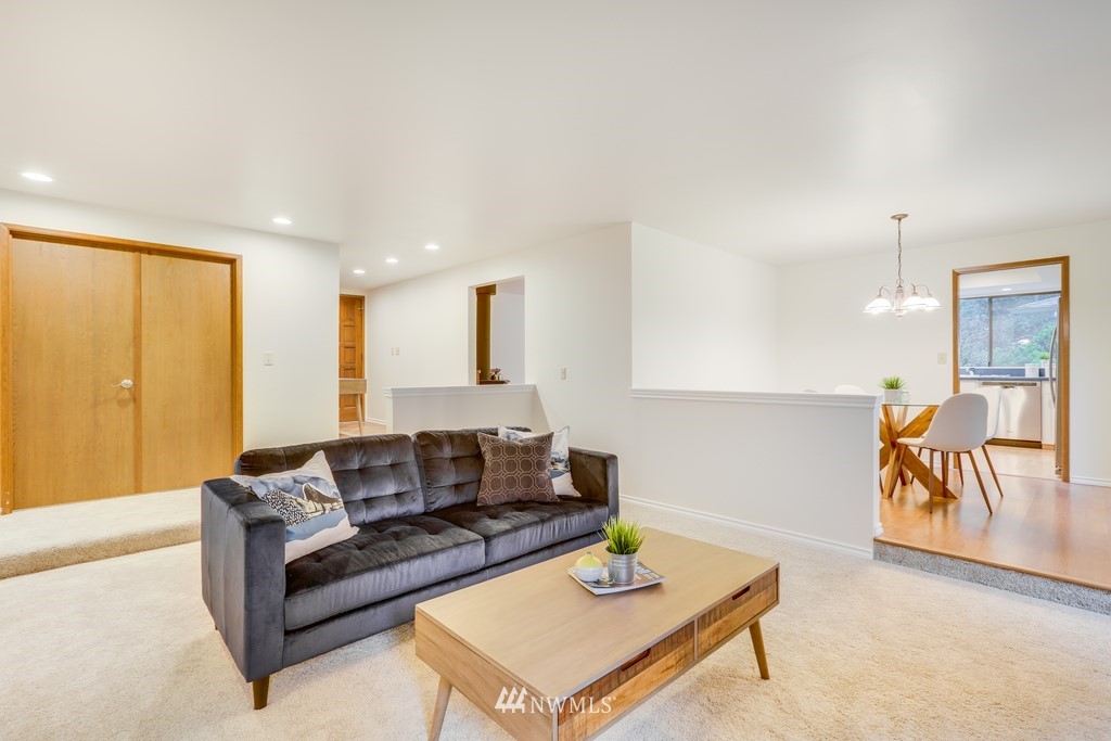 15909 Southeast 178th Street Renton, WA 98058 - Photo 9 of 30 a living room with furniture and a table