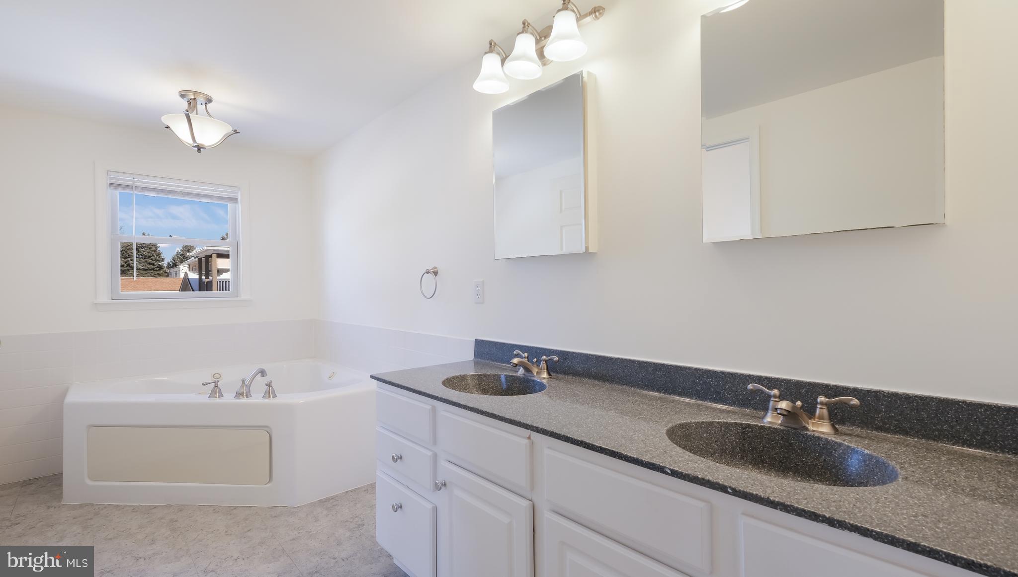 2186 Kent Road Huntingdon Valley, PA 19006 - Photo 14 of 33 Primary Bathroom with double vanity and Jaccuzi