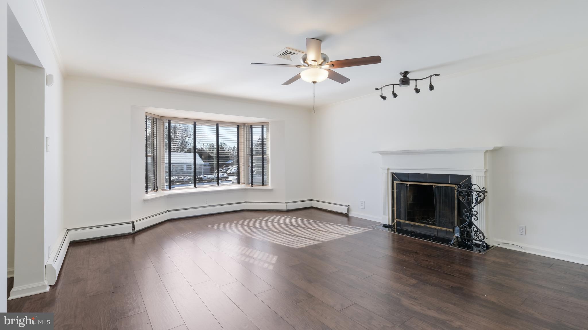 2186 Kent Road Huntingdon Valley, PA 19006 - Photo 2 of 33 Family Room with fireplace and new flooring
