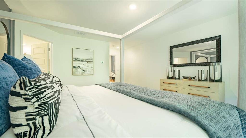 3568 Matthew Court Decatur, GA 30030 - Photo 17 of 30 a bedroom with a bed and painting on the wall