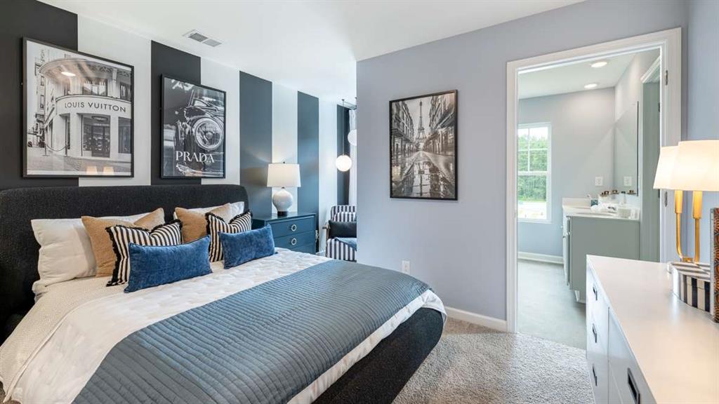 3568 Matthew Court Decatur, GA 30030 - Photo 24 of 30 a bedroom with bed and painting on the wall