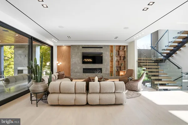 a view of a livingroom with furniture and window