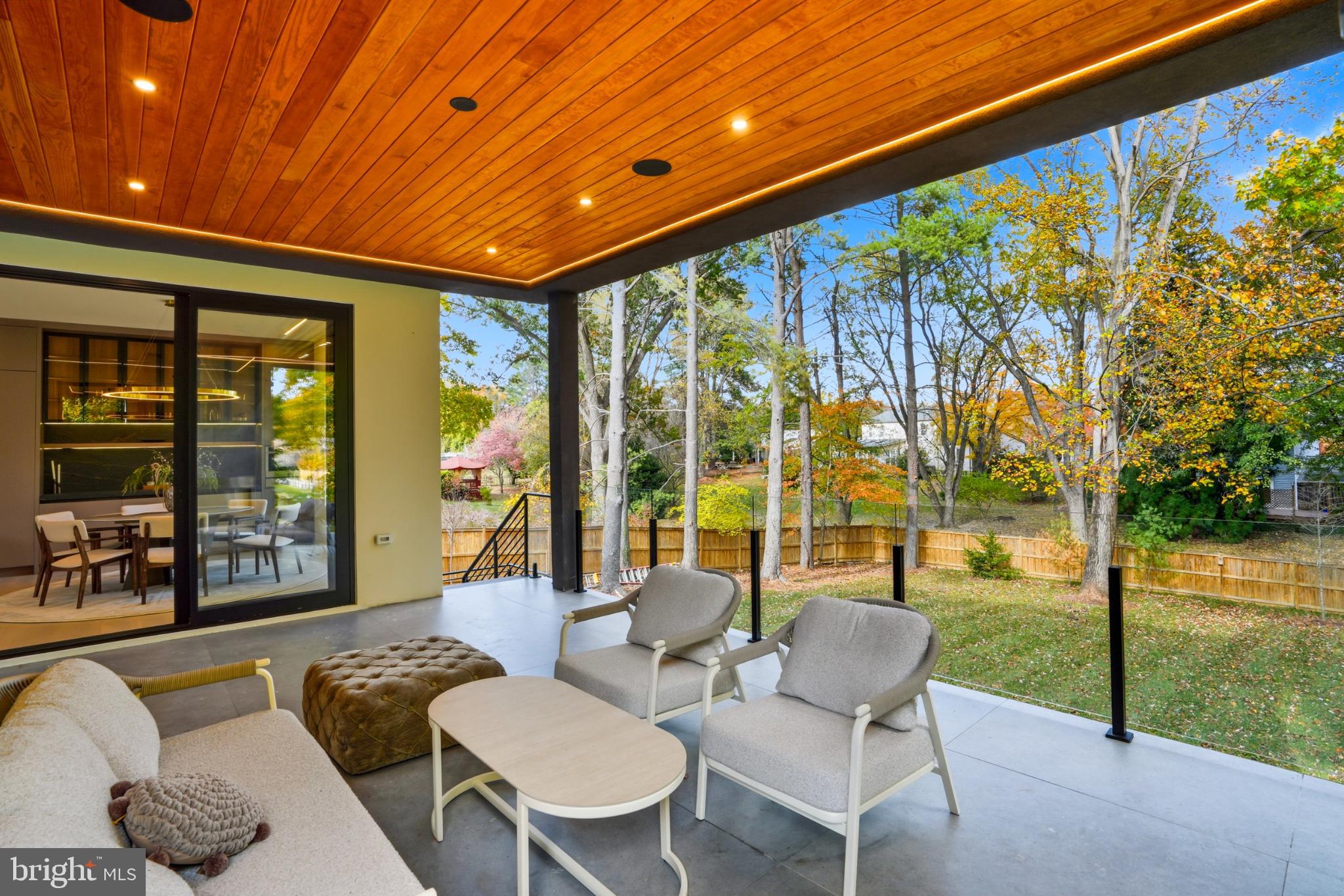 9408 Old Courthouse Road Vienna, VA 22182 - Photo 32 of 92 Serene outdoor living with vibrant autumn hues.