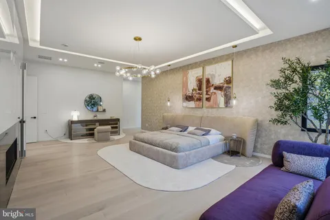 a bathroom with a mirror and a shower