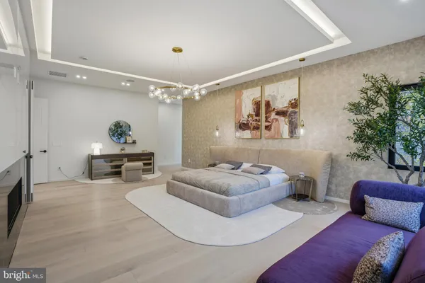 a bathroom with a mirror and a shower