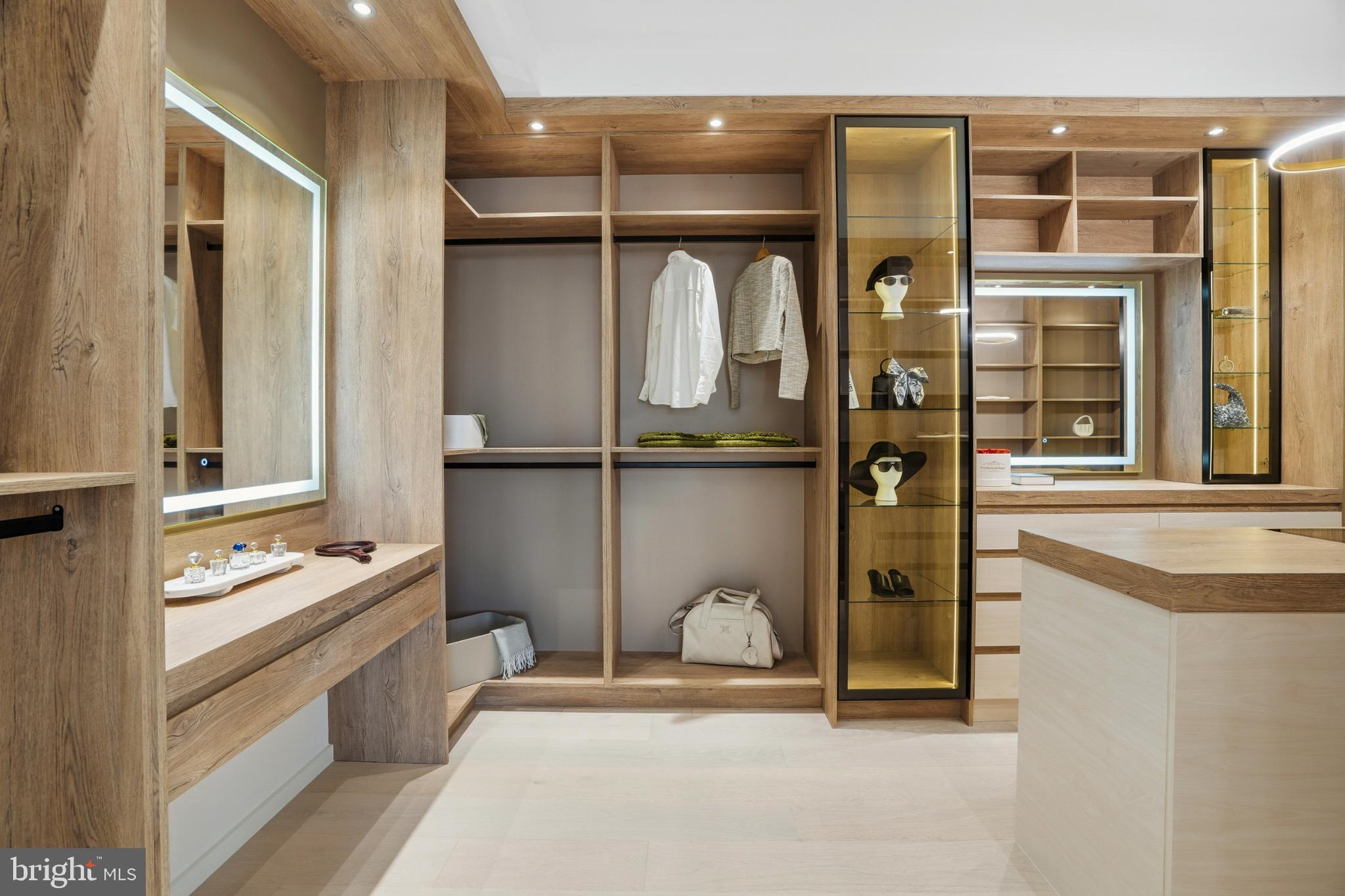 9408 Old Courthouse Road Vienna, VA 22182 - Photo 51 of 92 Sleek, modern closet with elegant storage.