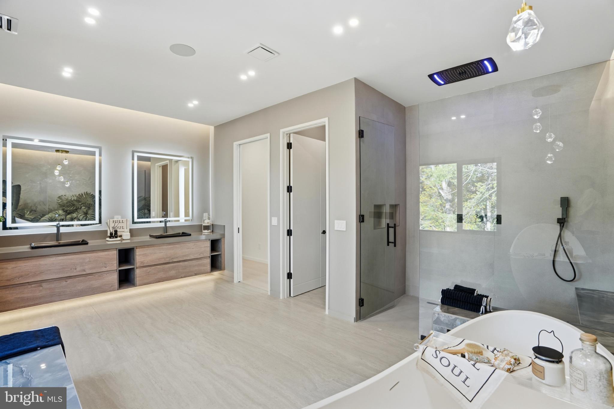 9408 Old Courthouse Road Vienna, VA 22182 - Photo 56 of 92 Sleek modern bathroom with elegant finishes.