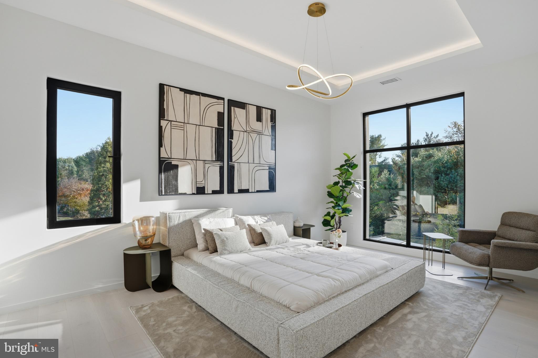 9408 Old Courthouse Road Vienna, VA 22182 - Photo 61 of 92 a bedroom with large bed and a large window