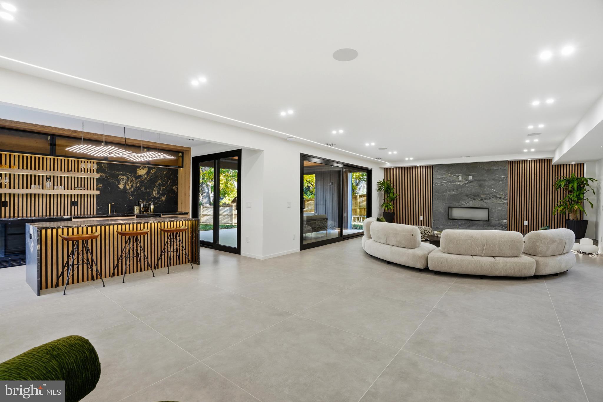 9408 Old Courthouse Road Vienna, VA 22182 - Photo 73 of 92 a living room with furniture and a large window