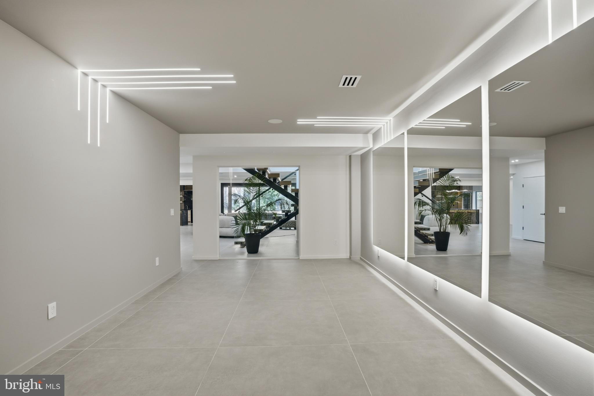 9408 Old Courthouse Road Vienna, VA 22182 - Photo 82 of 92 Sleek modern space with striking lighting.