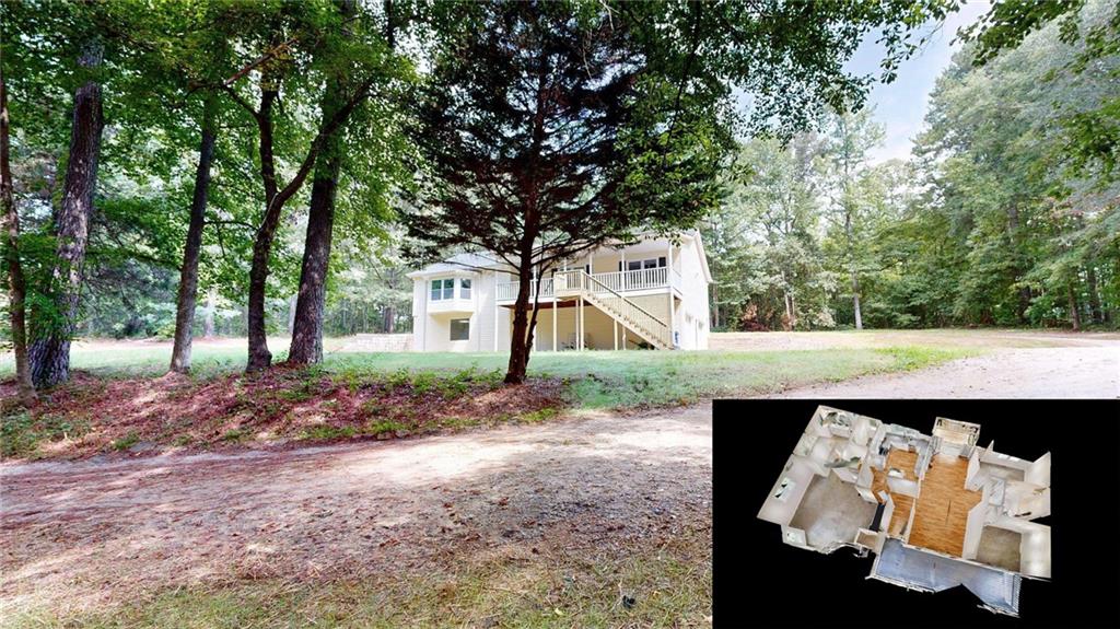 1905 Rockmart Road Villa Rica, GA 30180 - Photo 1 of 1 a view of outdoor space and yard