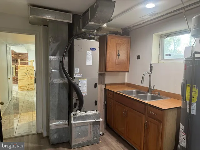 a bathroom with a sink double vanity and a mirror
