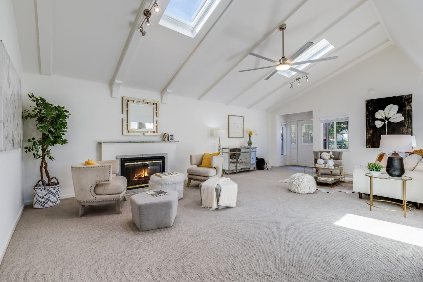1253 Pomeroy Avenue Santa Clara, CA 95051 - Photo 3 of 17 a living room with furniture and a fireplace