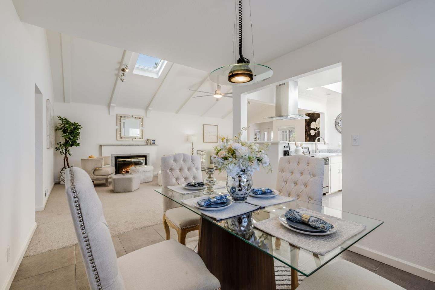 1253 Pomeroy Avenue Santa Clara, CA 95051 - Photo 5 of 17 a kitchen with a table and chairs in it