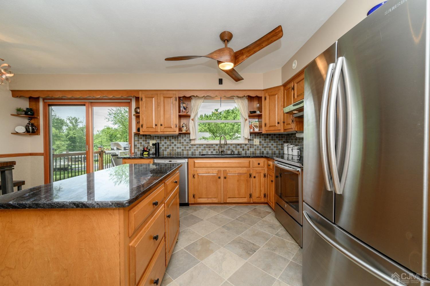 119 Mt Grove Road Califon, NJ 07830 - Photo 15 of 40 a kitchen with stainless steel appliances granite countertop a refrigerator and a sink