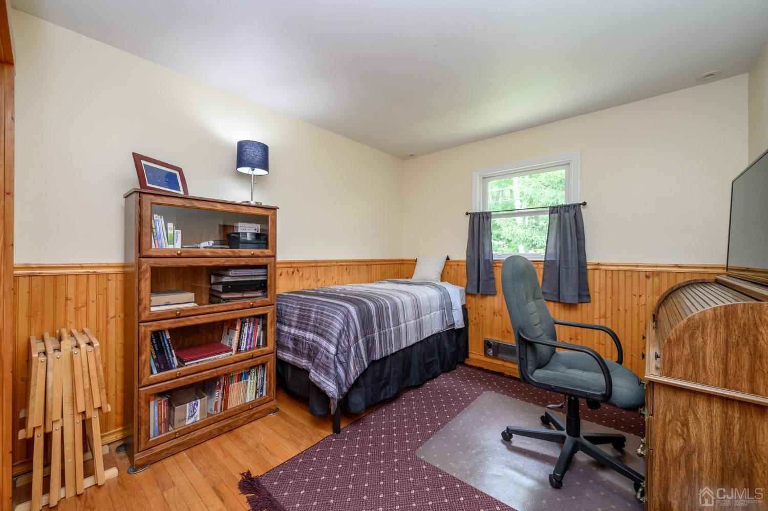 119 Mt Grove Road Califon, NJ 07830 - Photo 23 of 40 a bedroom with furniture and a book shelf