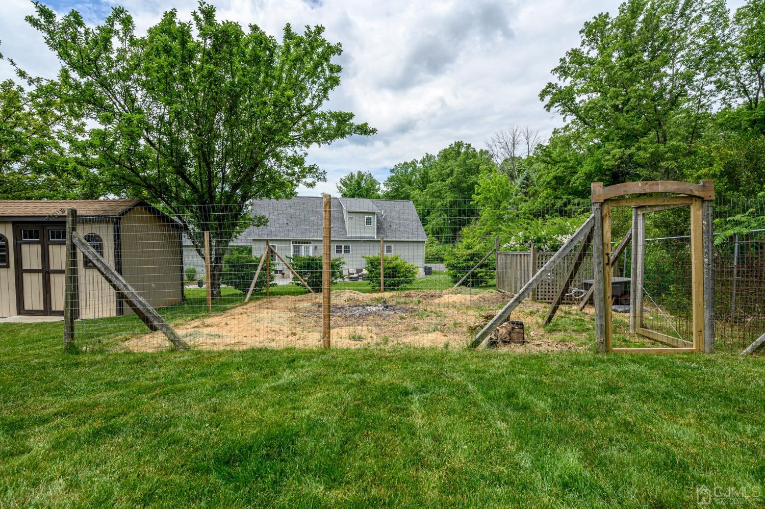 119 Mt Grove Road Califon, NJ 07830 - Photo 36 of 40 a view of a house with a backyard and a slide