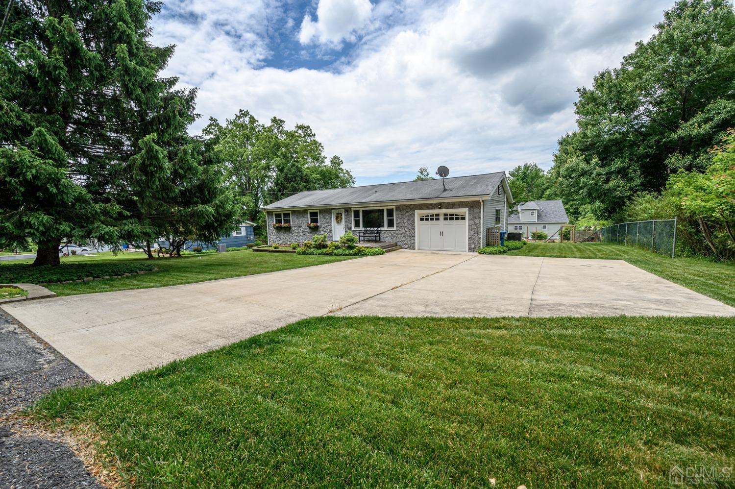119 Mt Grove Road Califon, NJ 07830 - Photo 40 of 40 a view of house with a big yard and potted plants