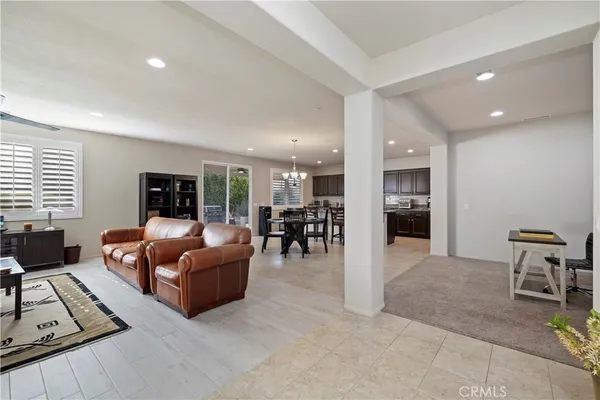 a living room with furniture and a table