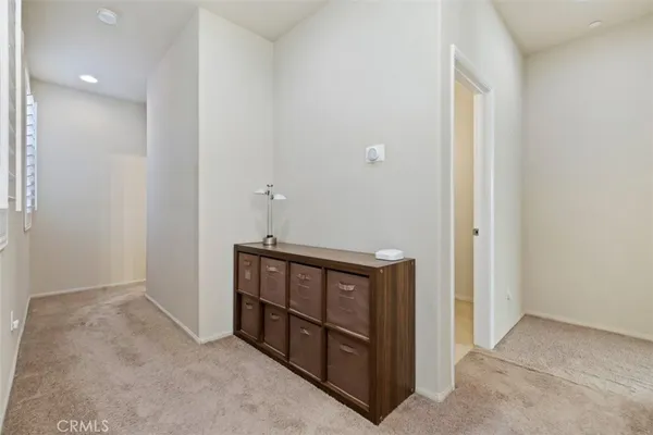 a view of a hallway with closet