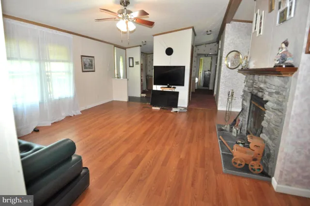 a bedroom with furniture and a fireplace