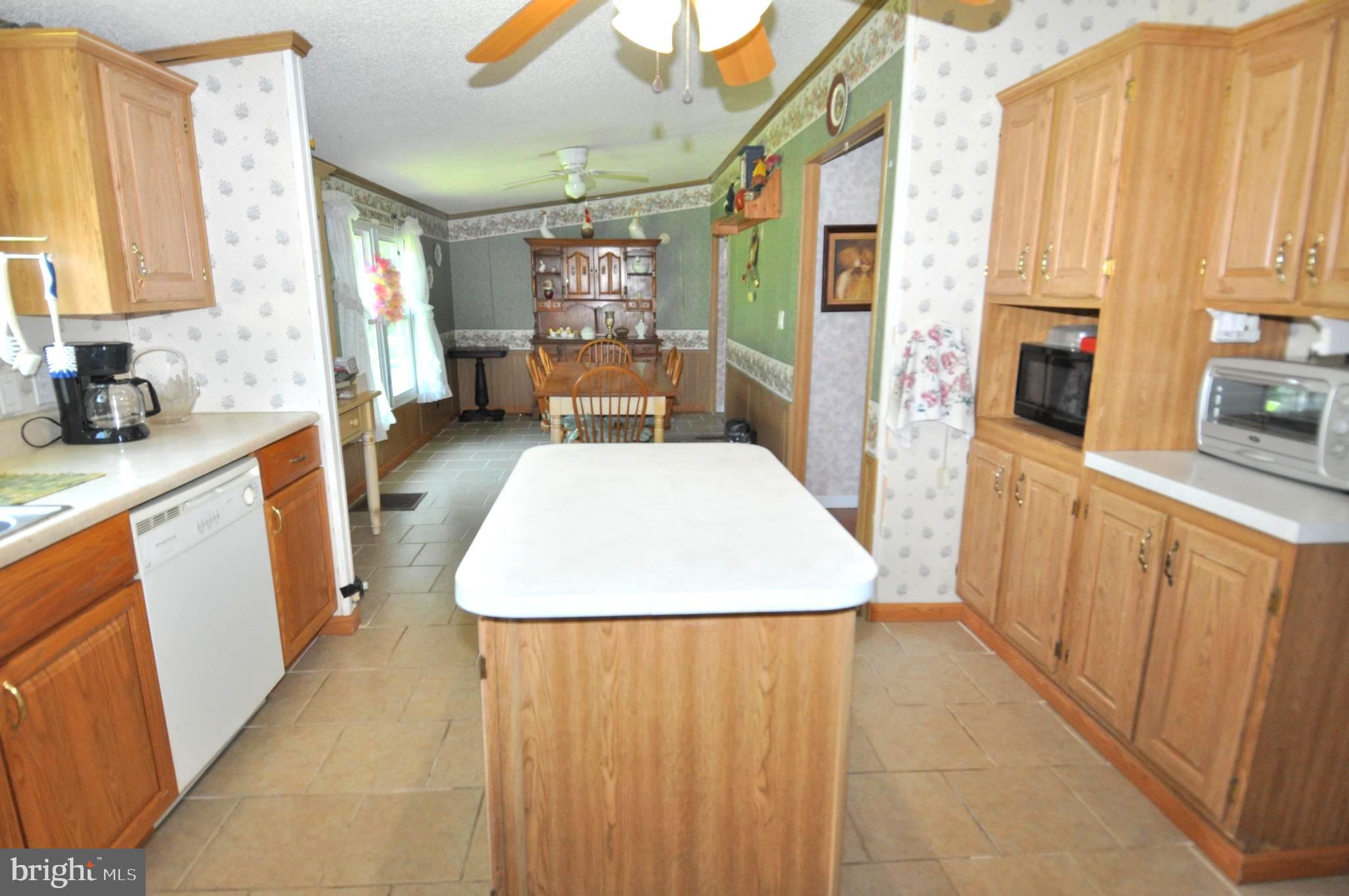 8160 Mennonite Church Road Westover, MD 21871 - Photo 18 of 39 kitchen toward family/dining
