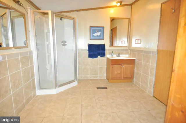 a view of walk in closet with window