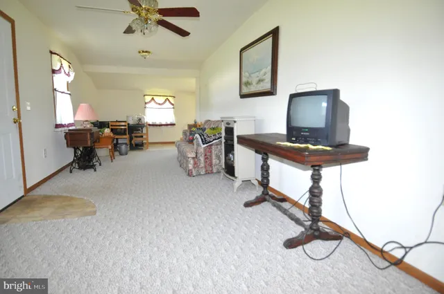 a view of a workspace with furniture