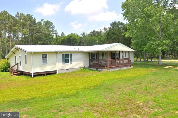 a view of a house with a swimming pool