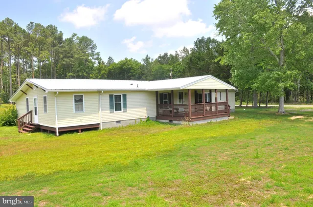 a view of a house with a swimming pool