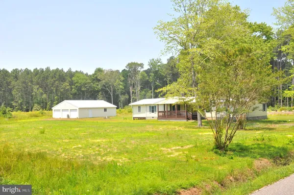 a view of a swimming pool with an ocean view