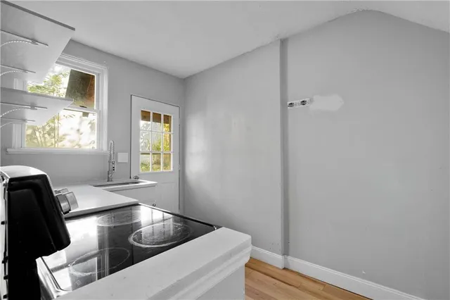 a kitchen with a window and a sink