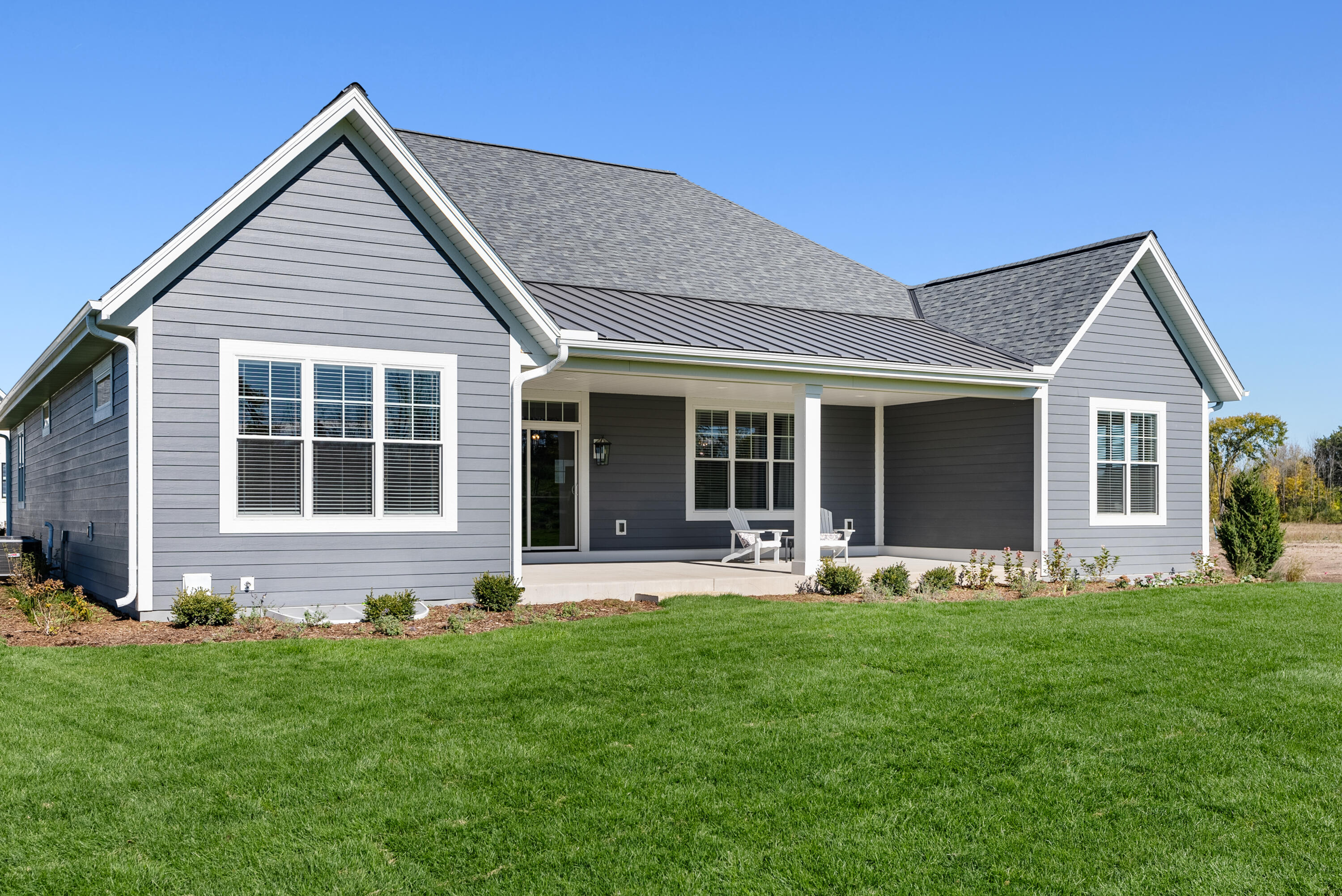 1749 North River Road Milwaukee, WI 53217 - Photo 34 of 40 Rear elevation & covered patio